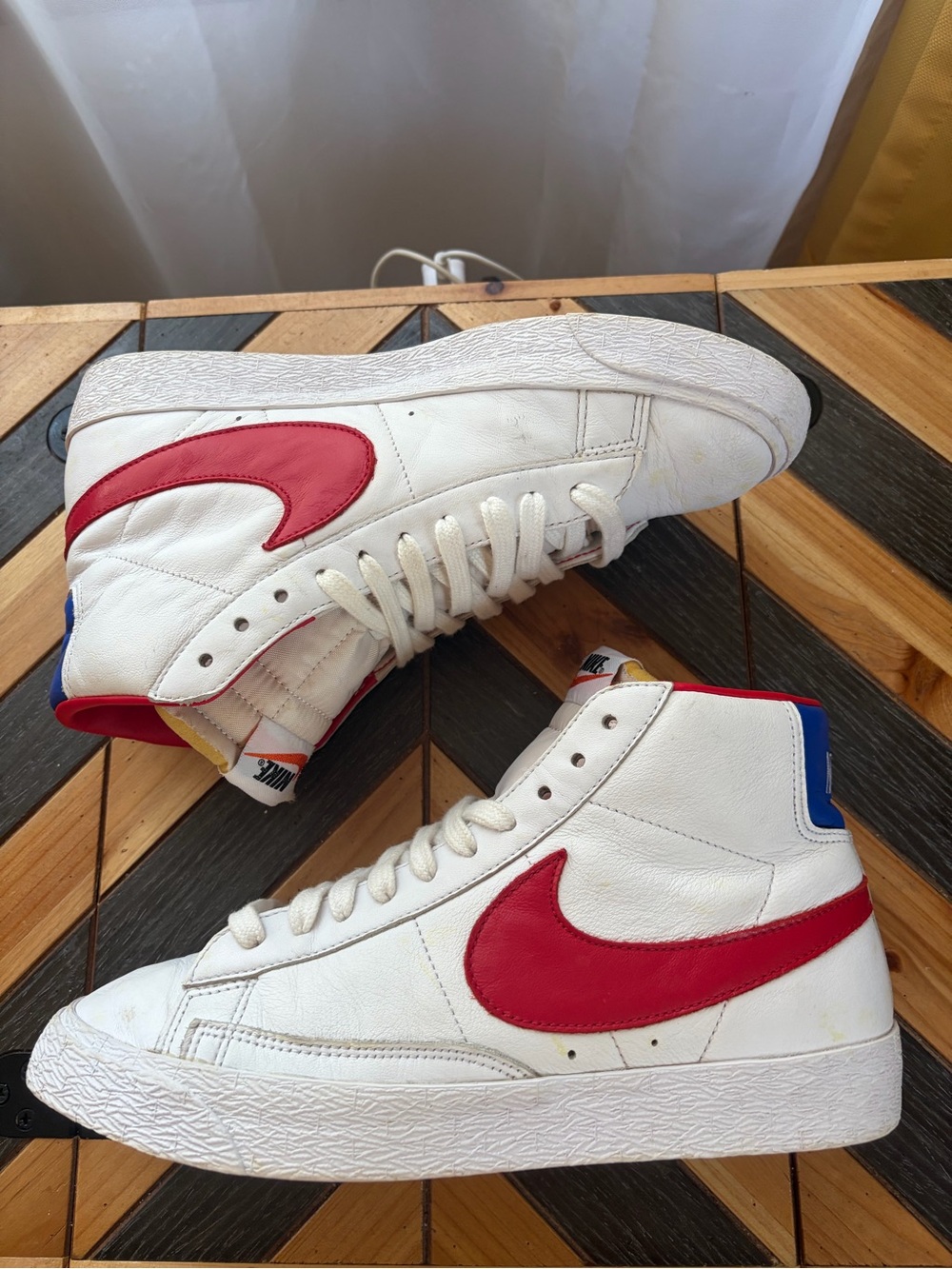 Nike Mid Blazer White High-Top Sneakers with Red Swoosh and Blue Heel